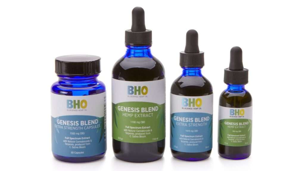 Four distinct CBD products from Bluegrass Hemp Oil displayed side by side: Genesis Blend Extra Strength Capsules, 4 oz Genesis Blend Full Spectrum CBD Oil, Genesis Blend Extra Strength Full Spectrum CBD Oil, and 1 oz Genesis Blend Hemp Extract CBD Oil.