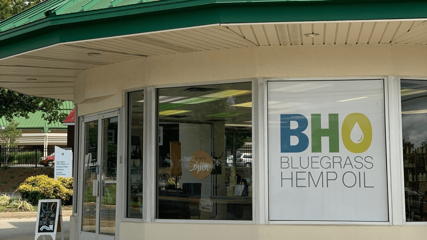 Exterior view of Bluegrass Hemp Oil CBD store, located at 190 Lexington Green Circle Road, Lexington, Kentucky, showcasing the store's facade with prominent signage and a welcoming entrance.