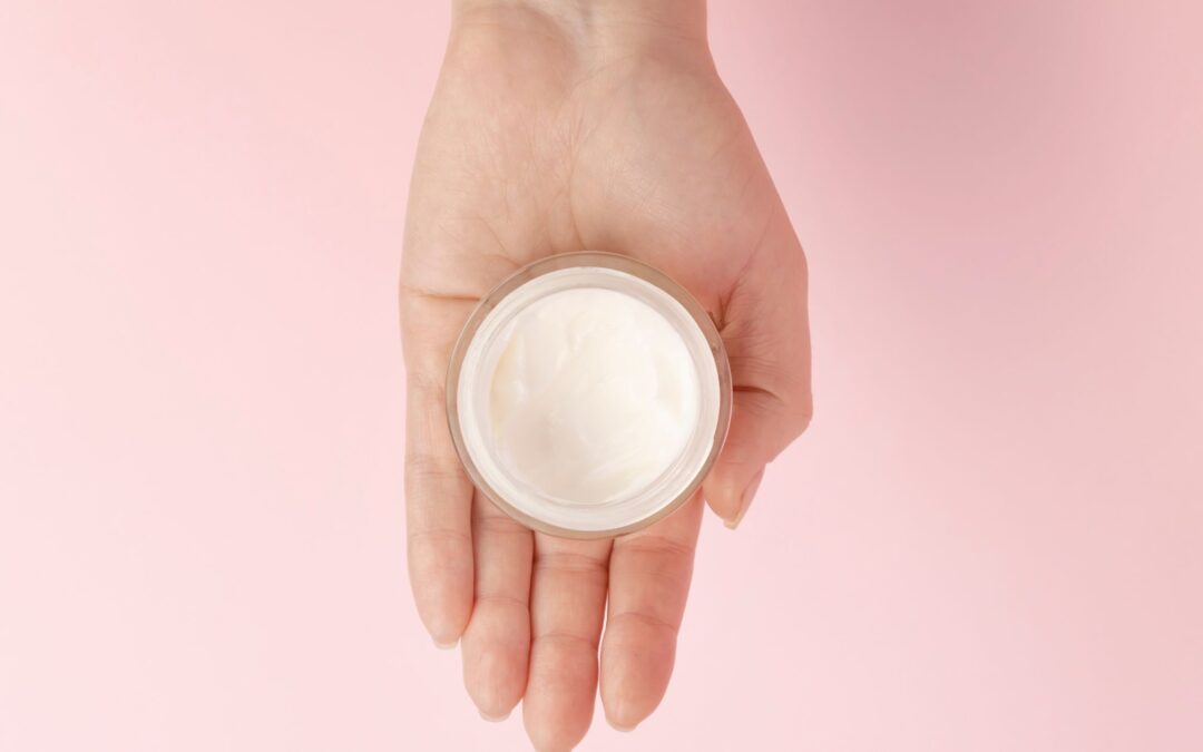 A jar of CBD salve with a creamy texture, used for targeted pain relief and inflammation.