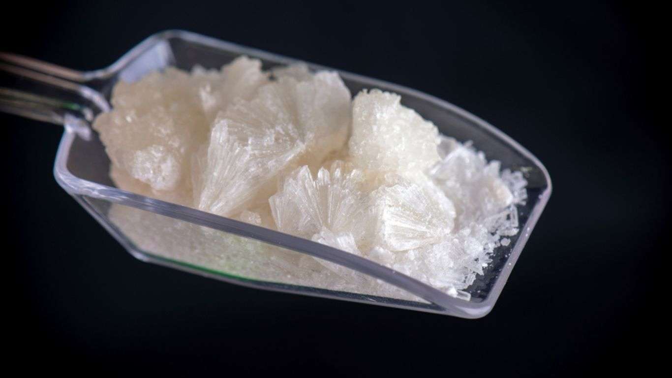 Close-up image of isolated cannabidiol (CBD) crystals, showcasing the pure, crystalline form of CBD separate from other hemp plant compounds.