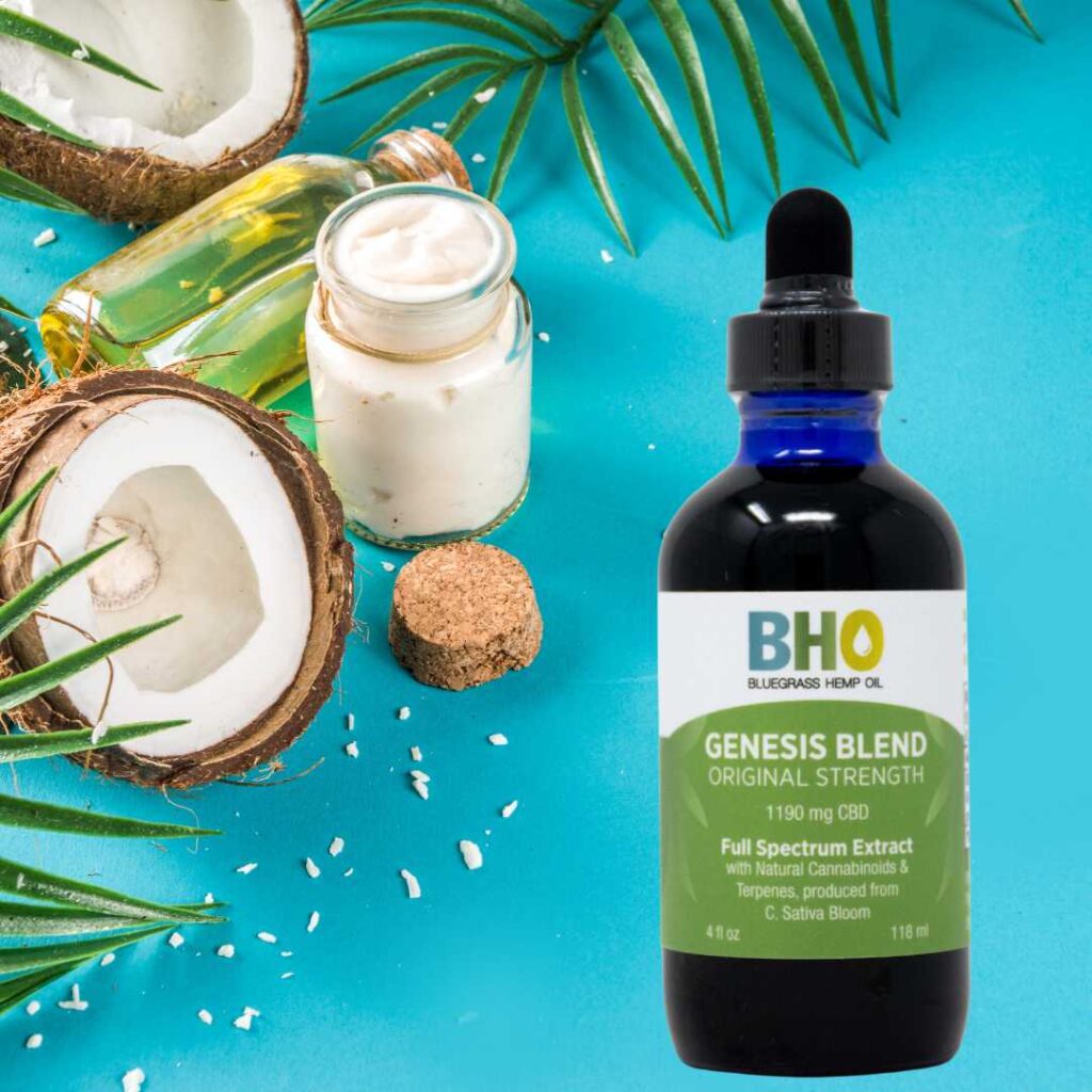  Coconuts with a jar of MCT oil and Genesis Blend CBD oil bottle
